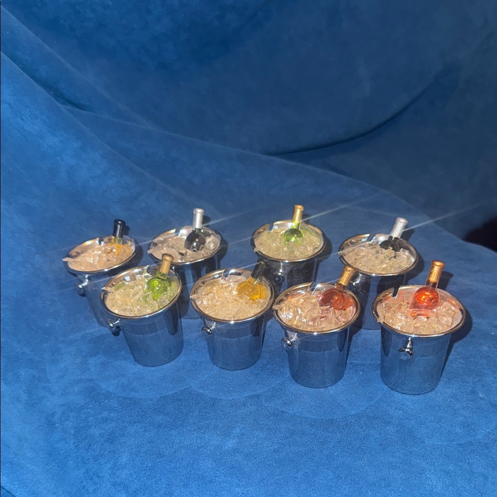 8 Miniature Silver Buckets with different iced wine inside. All decorative.